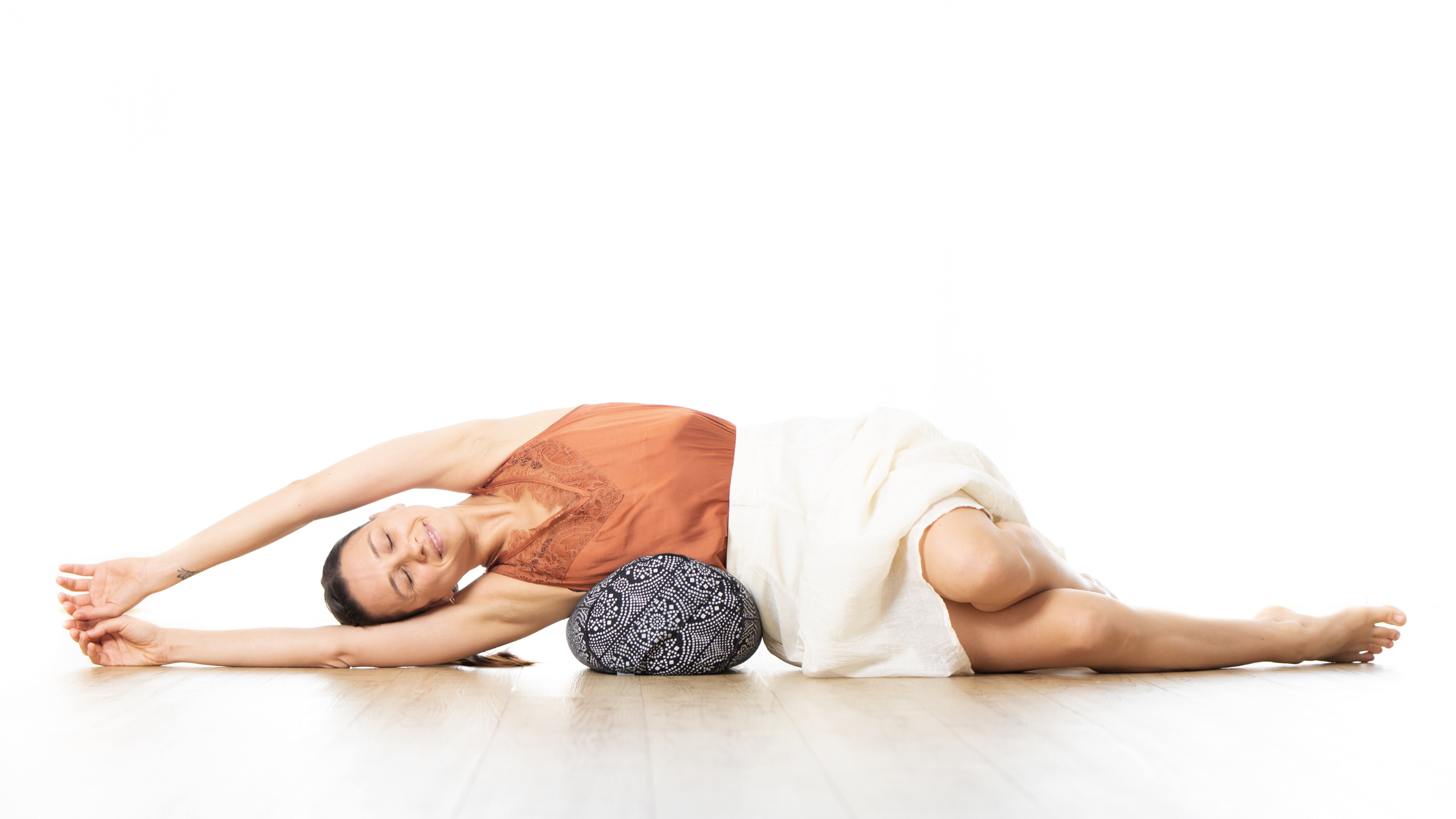 twist with a bolster yoga