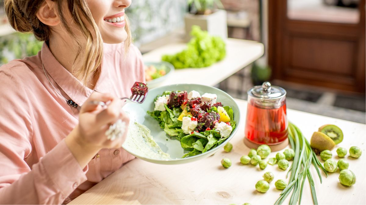 A photo of a woman eating the right food