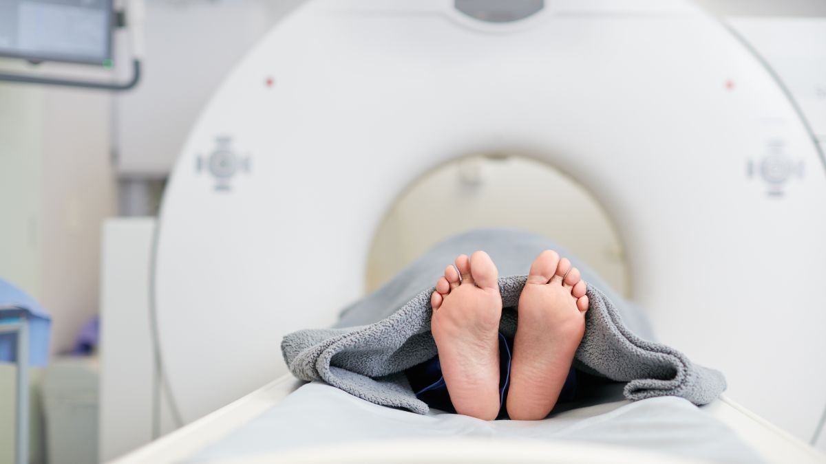 A photo of a person in an MRI