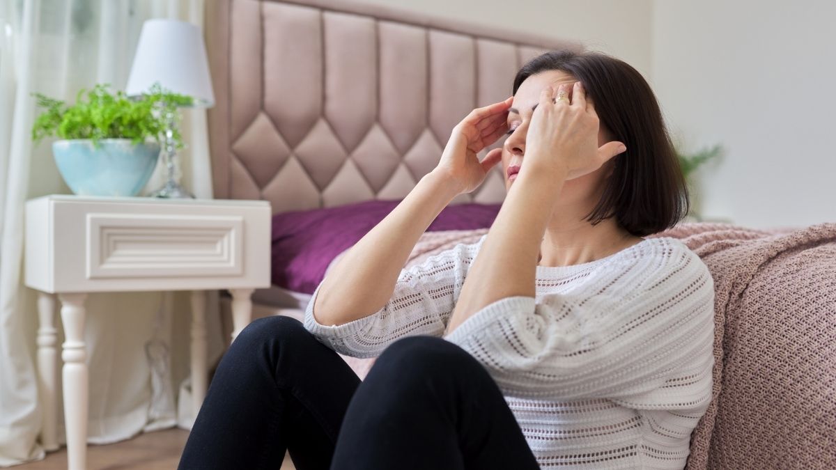 A woman having a headache